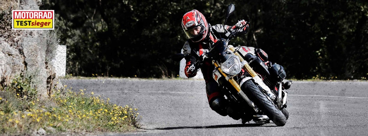 Dunlop's RoadSmart III tyre on a BMW R1200 RS, taking a corner on a country road